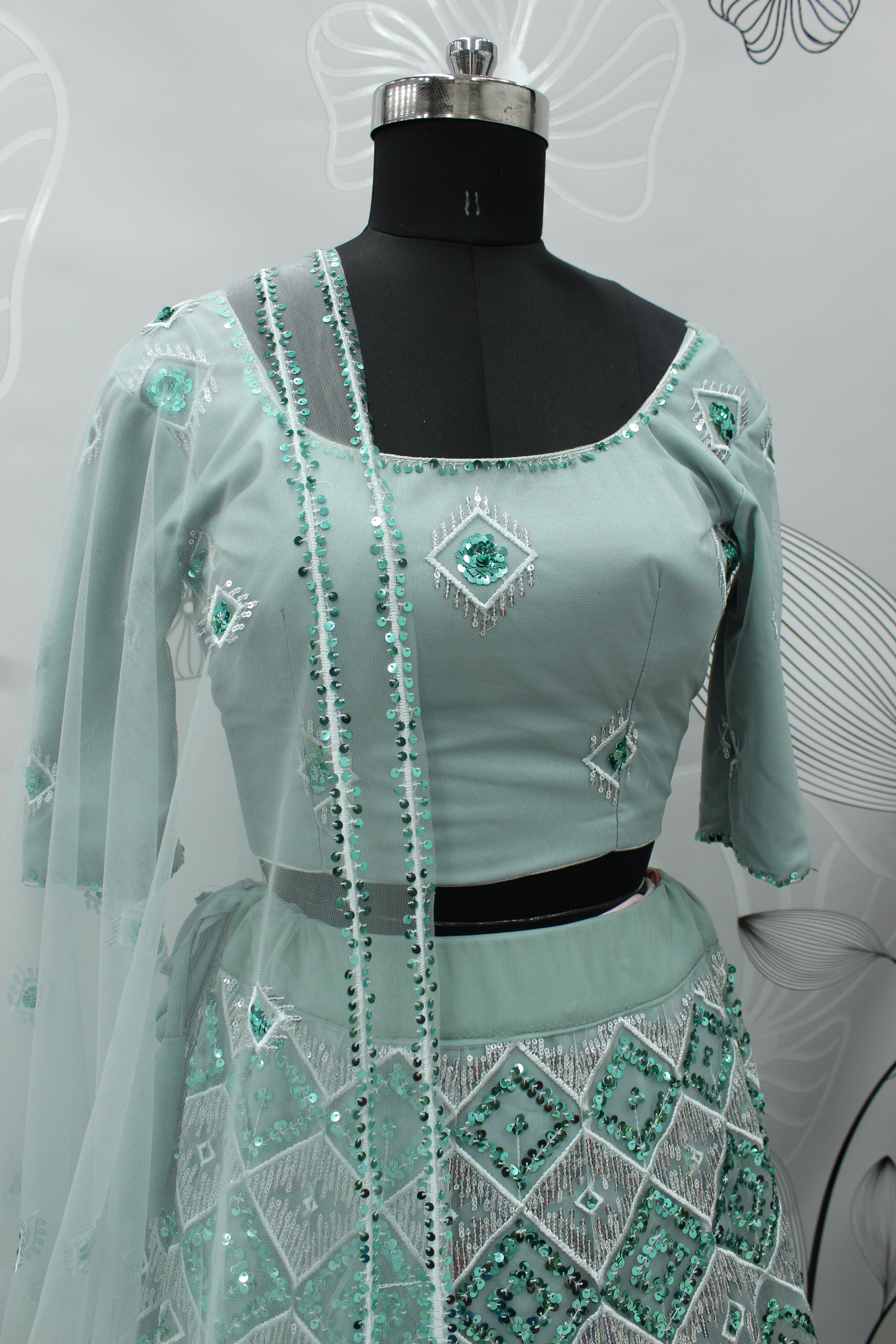 Net Lehenga Choli in greyish Blue with Embroidered